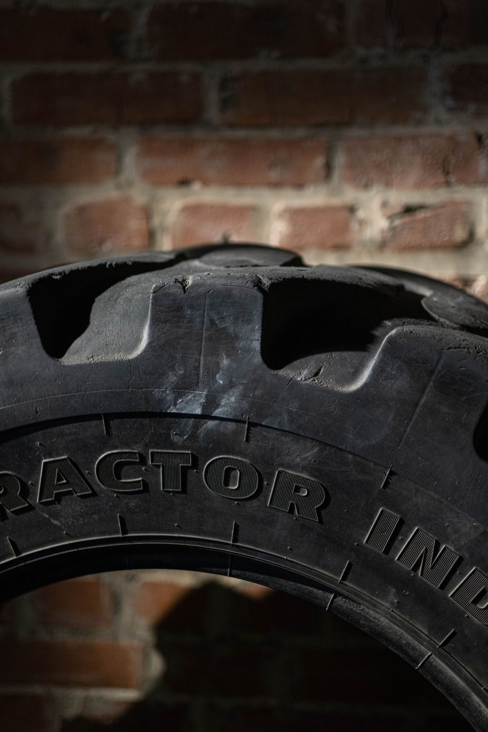 Home gym setup with a tire and cinderblocks